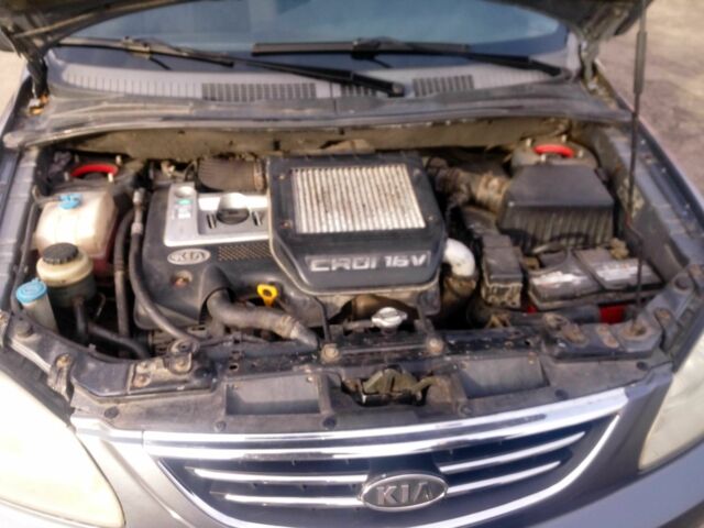 Сірий Кіа Каренс, об'ємом двигуна 2 л та пробігом 270 тис. км за 4200 $, фото 7 на Automoto.ua