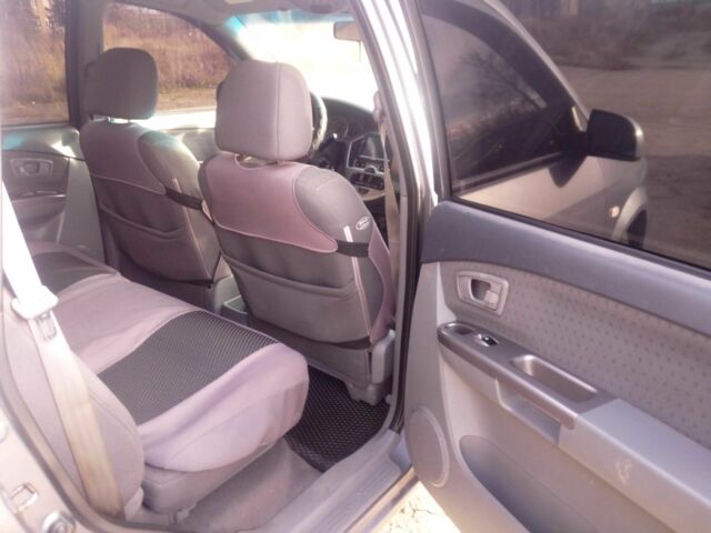 Сірий Кіа Каренс, об'ємом двигуна 2 л та пробігом 270 тис. км за 4200 $, фото 13 на Automoto.ua