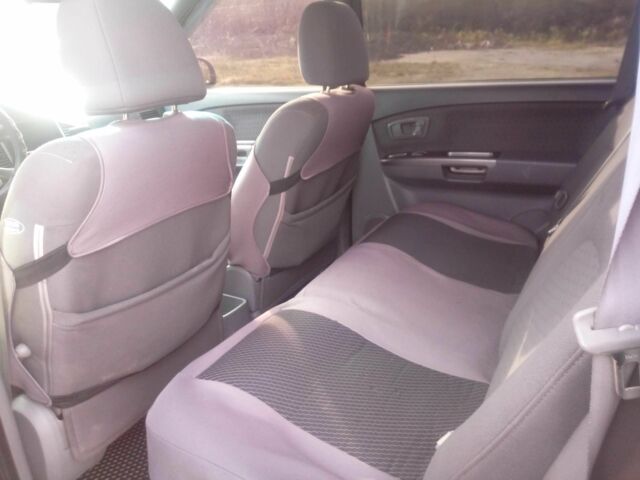 Сірий Кіа Каренс, об'ємом двигуна 2 л та пробігом 270 тис. км за 4200 $, фото 14 на Automoto.ua