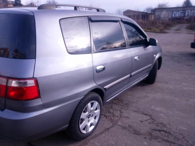 Сірий Кіа Каренс, об'ємом двигуна 2 л та пробігом 270 тис. км за 4200 $, фото 8 на Automoto.ua