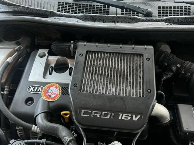 Серый Киа Каренс, объемом двигателя 2 л и пробегом 340 тыс. км за 1250 $, фото 11 на Automoto.ua