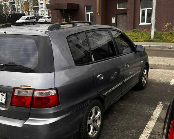 Сірий Кіа Каренс, об'ємом двигуна 1.8 л та пробігом 300 тис. км за 2600 $, фото 4 на Automoto.ua