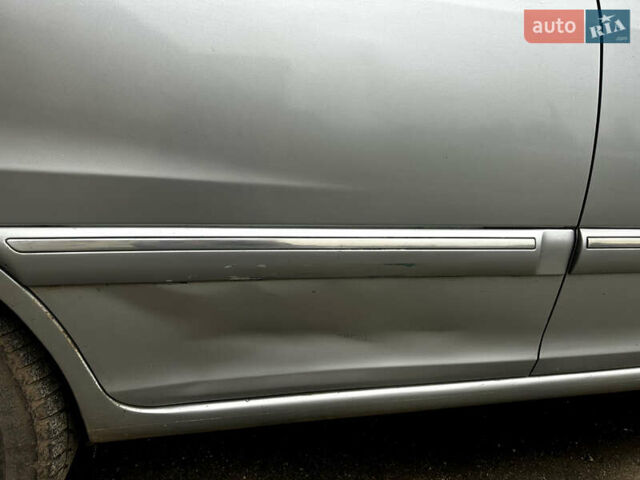 Сірий Кіа Каренс, об'ємом двигуна 1.8 л та пробігом 207 тис. км за 4990 $, фото 14 на Automoto.ua