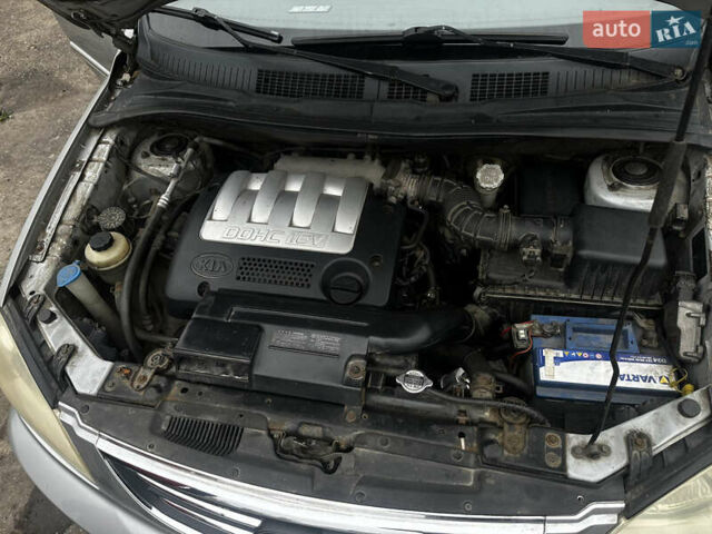 Сірий Кіа Каренс, об'ємом двигуна 1.8 л та пробігом 207 тис. км за 4990 $, фото 13 на Automoto.ua