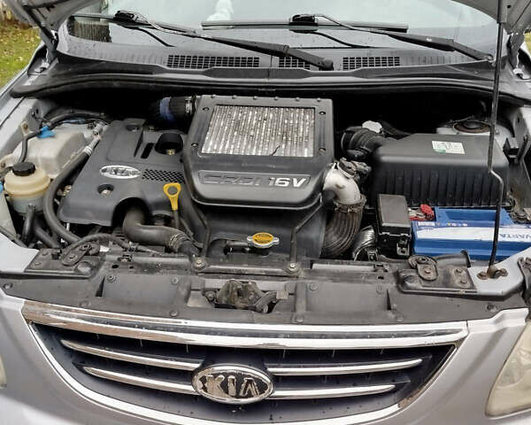 Серый Киа Каренс, объемом двигателя 1.99 л и пробегом 200 тыс. км за 6200 $, фото 7 на Automoto.ua