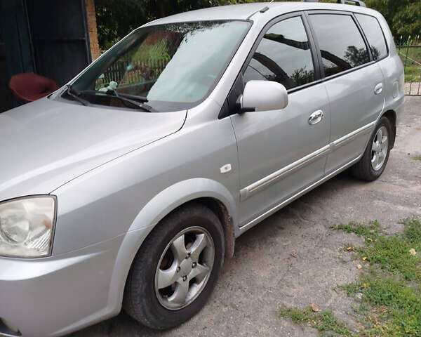 Серый Киа Каренс, объемом двигателя 1.99 л и пробегом 200 тыс. км за 6200 $, фото 2 на Automoto.ua