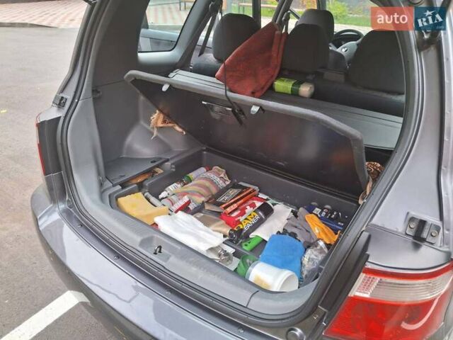 Серый Киа Каренс, объемом двигателя 2 л и пробегом 174 тыс. км за 5000 $, фото 6 на Automoto.ua