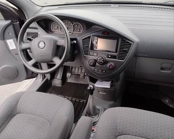 Сірий Кіа Каренс, об'ємом двигуна 1.59 л та пробігом 218 тис. км за 4800 $, фото 4 на Automoto.ua