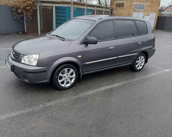 Сірий Кіа Каренс, об'ємом двигуна 1.59 л та пробігом 218 тис. км за 4800 $, фото 3 на Automoto.ua