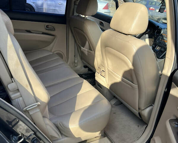 Сірий Кіа Каренс, об'ємом двигуна 2 л та пробігом 224 тис. км за 5200 $, фото 10 на Automoto.ua
