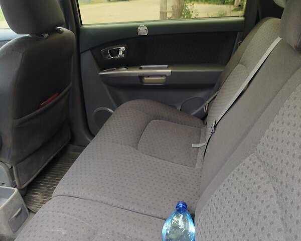 Серый Киа Каренс, объемом двигателя 1.59 л и пробегом 207 тыс. км за 4300 $, фото 6 на Automoto.ua