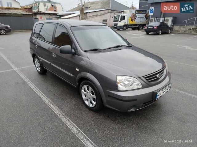 Сірий Кіа Каренс, об'ємом двигуна 1.59 л та пробігом 218 тис. км за 4800 $, фото 1 на Automoto.ua