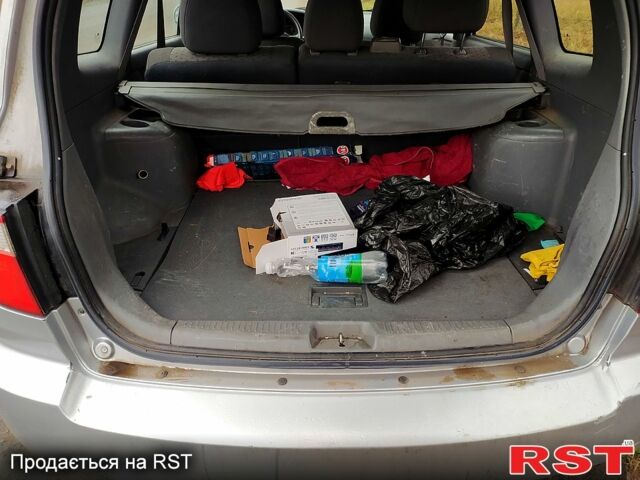 Сірий Кіа Каренс, об'ємом двигуна 2 л та пробігом 220 тис. км за 1850 $, фото 5 на Automoto.ua