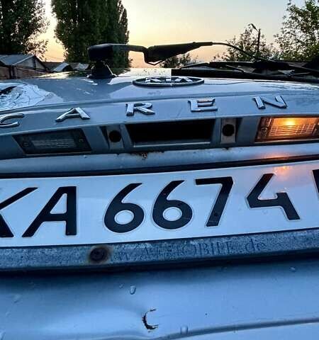 Серый Киа Каренс, объемом двигателя 1.98 л и пробегом 207 тыс. км за 3500 $, фото 25 на Automoto.ua