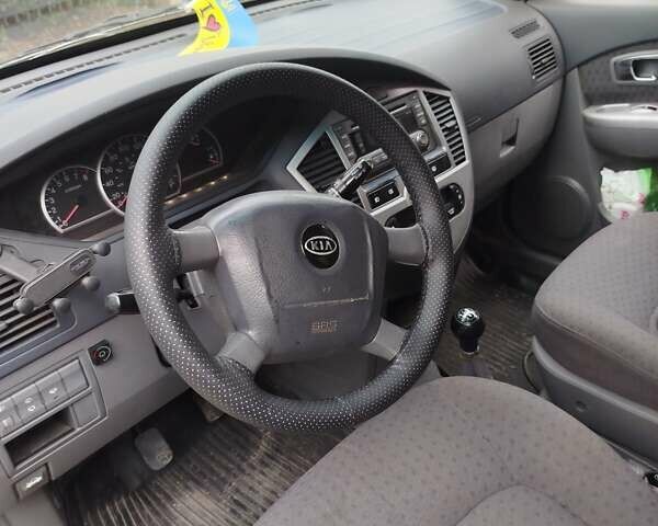 Серый Киа Каренс, объемом двигателя 1.59 л и пробегом 207 тыс. км за 4300 $, фото 8 на Automoto.ua