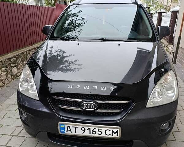 Сірий Кіа Каренс, об'ємом двигуна 2 л та пробігом 296 тис. км за 5600 $, фото 3 на Automoto.ua