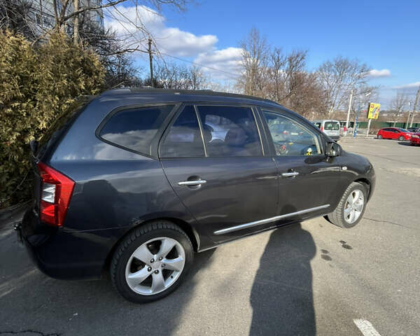 Сірий Кіа Каренс, об'ємом двигуна 2 л та пробігом 224 тис. км за 5200 $, фото 7 на Automoto.ua