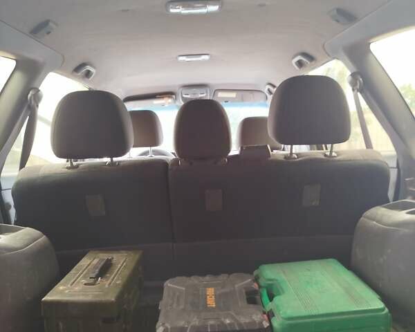 Серый Киа Каренс, объемом двигателя 1.59 л и пробегом 207 тыс. км за 4300 $, фото 1 на Automoto.ua