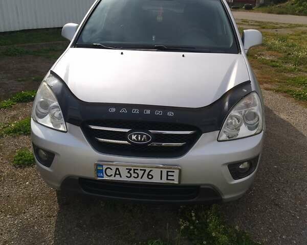 Сірий Кіа Каренс, об'ємом двигуна 2 л та пробігом 219 тис. км за 6600 $, фото 6 на Automoto.ua