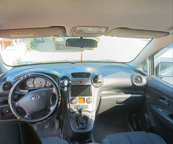Серый Киа Каренс, объемом двигателя 2 л и пробегом 300 тыс. км за 6300 $, фото 11 на Automoto.ua