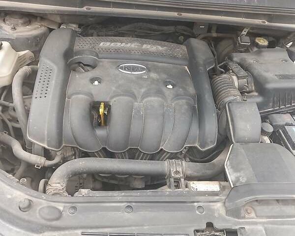 Серый Киа Каренс, объемом двигателя 2 л и пробегом 258 тыс. км за 5200 $, фото 7 на Automoto.ua