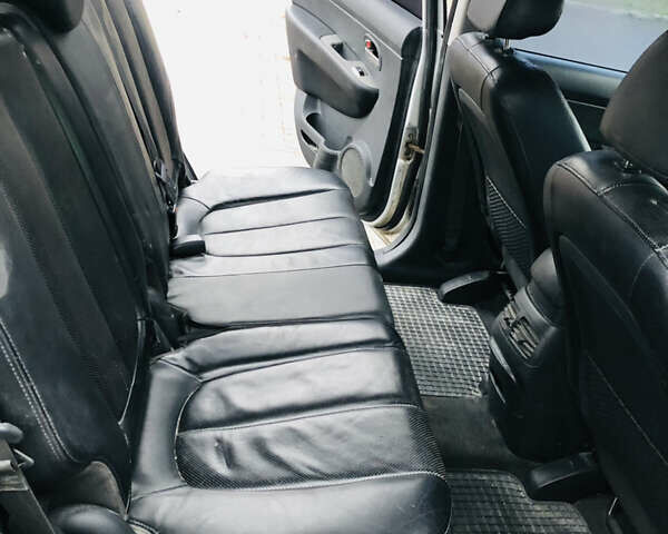 Серый Киа Каренс, объемом двигателя 1.99 л и пробегом 280 тыс. км за 4700 $, фото 8 на Automoto.ua