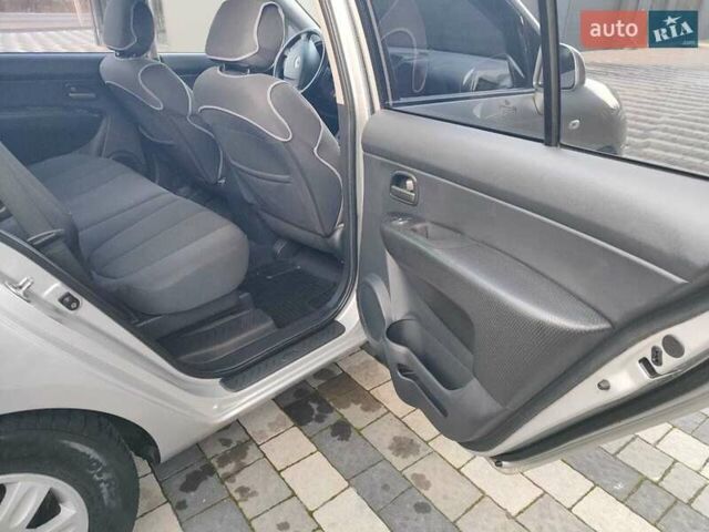 Серый Киа Каренс, объемом двигателя 2 л и пробегом 163 тыс. км за 5400 $, фото 41 на Automoto.ua