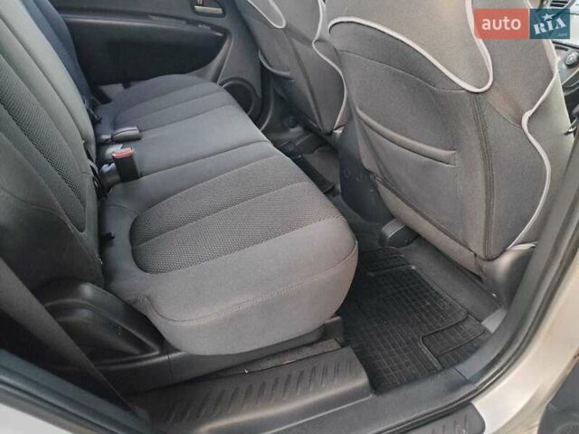 Серый Киа Каренс, объемом двигателя 2 л и пробегом 163 тыс. км за 5400 $, фото 42 на Automoto.ua