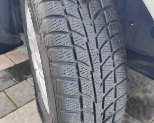 Серый Киа Каренс, объемом двигателя 2 л и пробегом 163 тыс. км за 5400 $, фото 25 на Automoto.ua