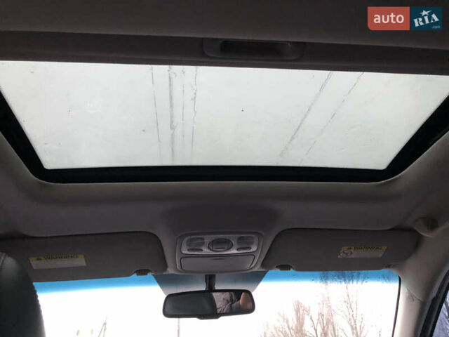 Серый Киа Каренс, объемом двигателя 1.99 л и пробегом 280 тыс. км за 4700 $, фото 10 на Automoto.ua