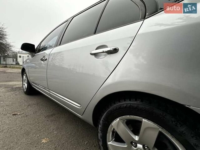 Серый Киа Каренс, объемом двигателя 2 л и пробегом 280 тыс. км за 4999 $, фото 18 на Automoto.ua