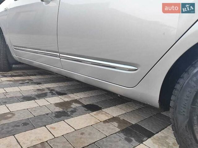 Серый Киа Каренс, объемом двигателя 2 л и пробегом 163 тыс. км за 5400 $, фото 27 на Automoto.ua