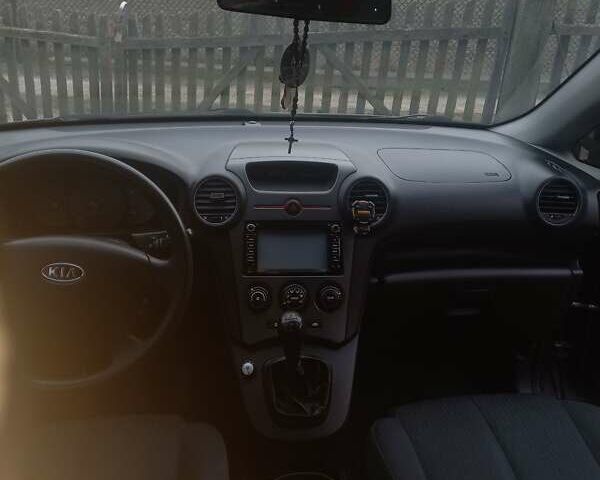 Серый Киа Каренс, объемом двигателя 2 л и пробегом 258 тыс. км за 5200 $, фото 4 на Automoto.ua