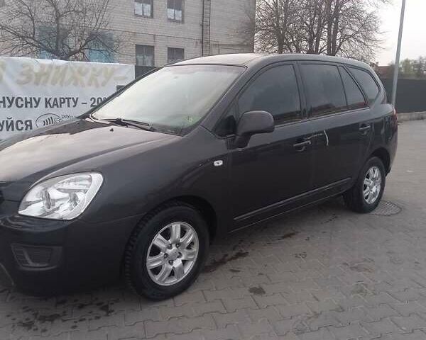 Серый Киа Каренс, объемом двигателя 2 л и пробегом 258 тыс. км за 5200 $, фото 3 на Automoto.ua