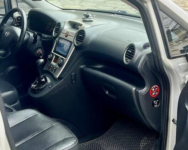 Серый Киа Каренс, объемом двигателя 2 л и пробегом 173 тыс. км за 6700 $, фото 15 на Automoto.ua