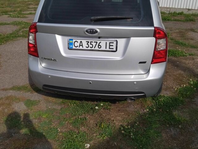 Сірий Кіа Каренс, об'ємом двигуна 2 л та пробігом 219 тис. км за 7150 $, фото 12 на Automoto.ua