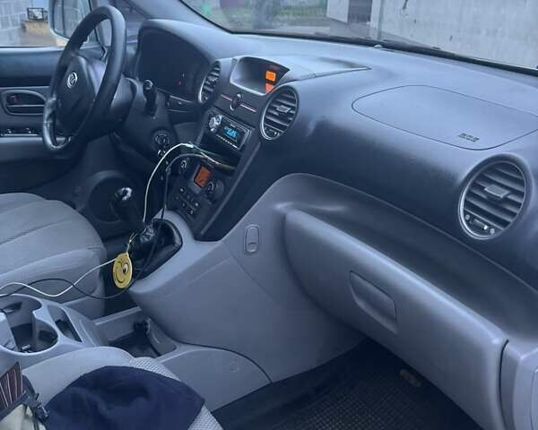 Серый Киа Каренс, объемом двигателя 2 л и пробегом 275 тыс. км за 4250 $, фото 1 на Automoto.ua