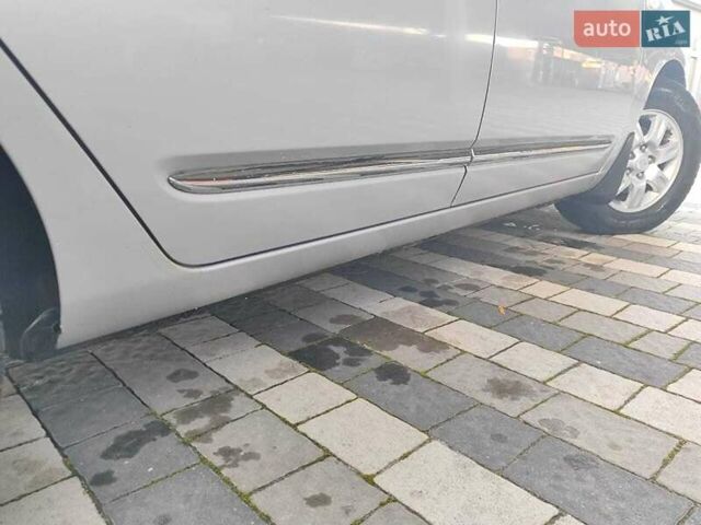 Серый Киа Каренс, объемом двигателя 2 л и пробегом 163 тыс. км за 5400 $, фото 28 на Automoto.ua