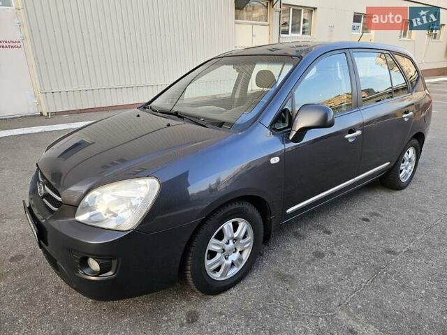 Серый Киа Каренс, объемом двигателя 2 л и пробегом 284 тыс. км за 5900 $, фото 2 на Automoto.ua