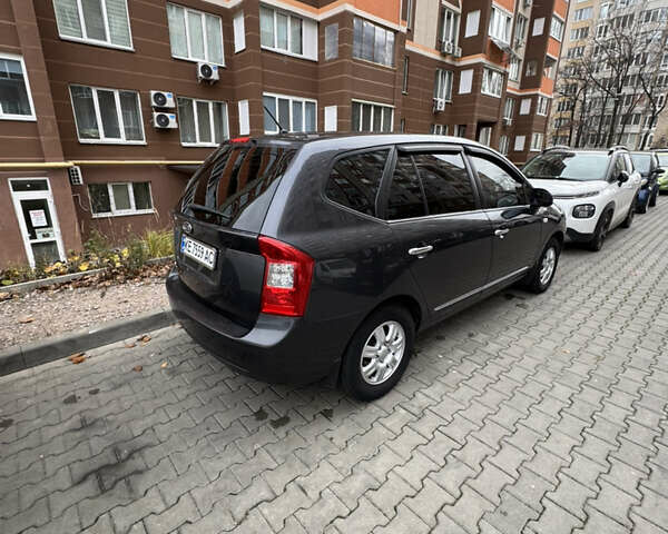 Серый Киа Каренс, объемом двигателя 2 л и пробегом 305 тыс. км за 5900 $, фото 2 на Automoto.ua