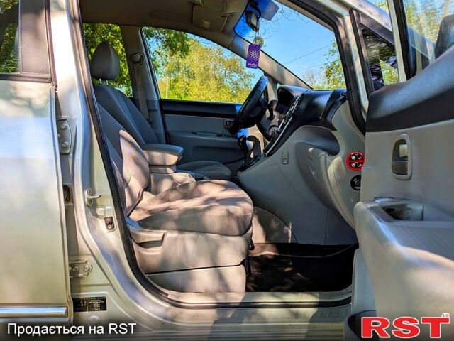 Сірий Кіа Каренс, об'ємом двигуна 2 л та пробігом 227 тис. км за 5250 $, фото 6 на Automoto.ua