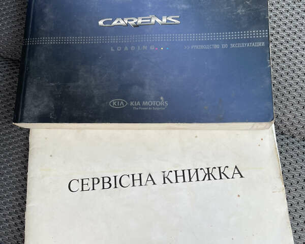 Сірий Кіа Каренс, об'ємом двигуна 1.9 л та пробігом 210 тис. км за 5500 $, фото 24 на Automoto.ua