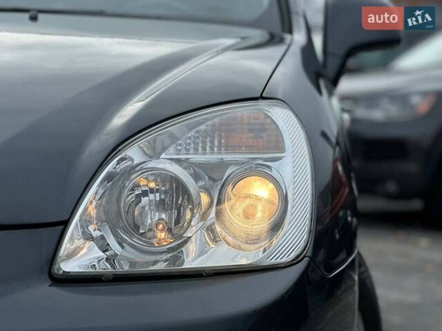 Серый Киа Каренс, объемом двигателя 2 л и пробегом 203 тыс. км за 5999 $, фото 3 на Automoto.ua