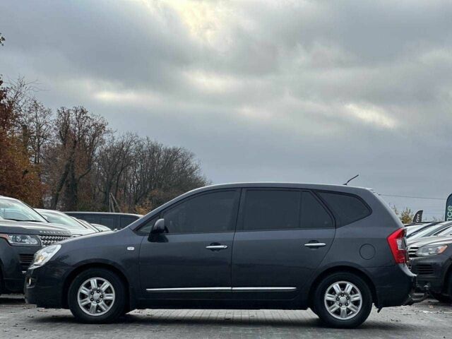 Серый Киа Каренс, объемом двигателя 2 л и пробегом 203 тыс. км за 5999 $, фото 4 на Automoto.ua