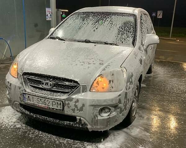 Серый Киа Каренс, объемом двигателя 2 л и пробегом 254 тыс. км за 5800 $, фото 1 на Automoto.ua
