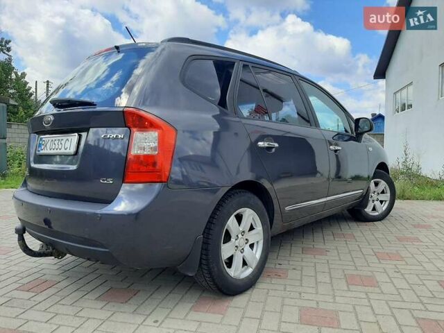 Сірий Кіа Каренс, об'ємом двигуна 1.99 л та пробігом 302 тис. км за 6400 $, фото 6 на Automoto.ua