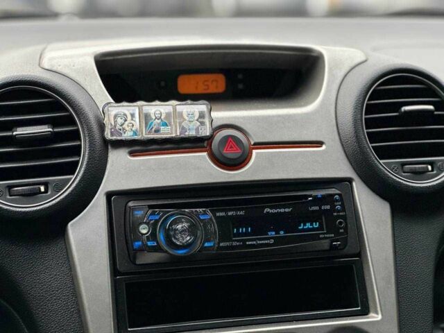 Серый Киа Каренс, объемом двигателя 2 л и пробегом 203 тыс. км за 5999 $, фото 18 на Automoto.ua