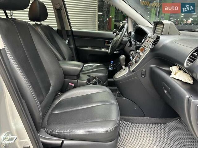 Сірий Кіа Каренс, об'ємом двигуна 2 л та пробігом 215 тис. км за 8990 $, фото 11 на Automoto.ua