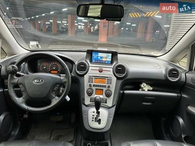Сірий Кіа Каренс, об'ємом двигуна 2 л та пробігом 215 тис. км за 8990 $, фото 20 на Automoto.ua