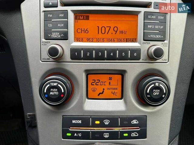 Сірий Кіа Каренс, об'ємом двигуна 2 л та пробігом 215 тис. км за 8990 $, фото 18 на Automoto.ua